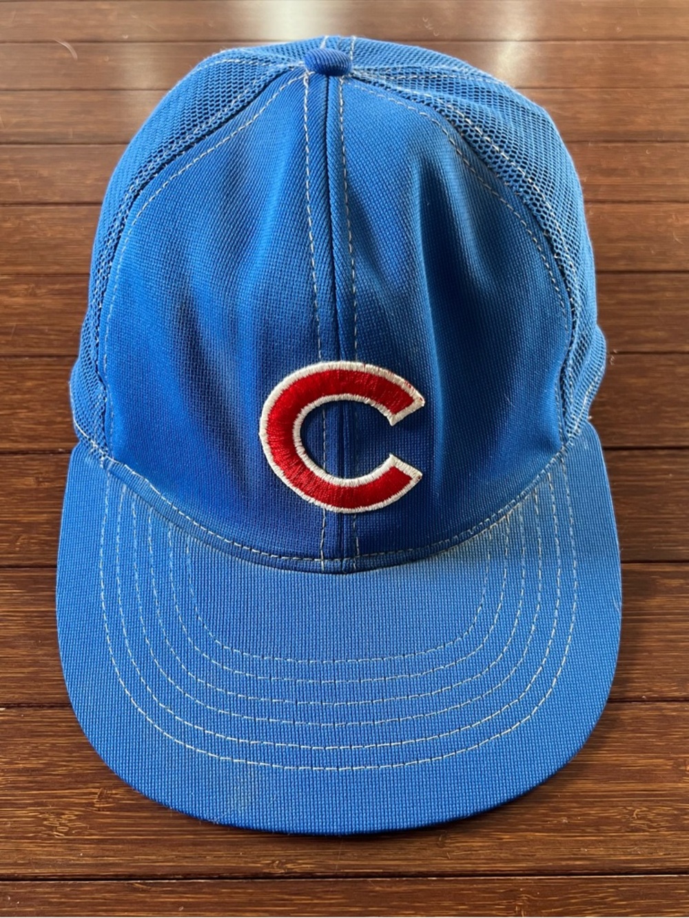 vintage Chicago Cubs baseball cap featuring a mesh back and an embroidered "C"